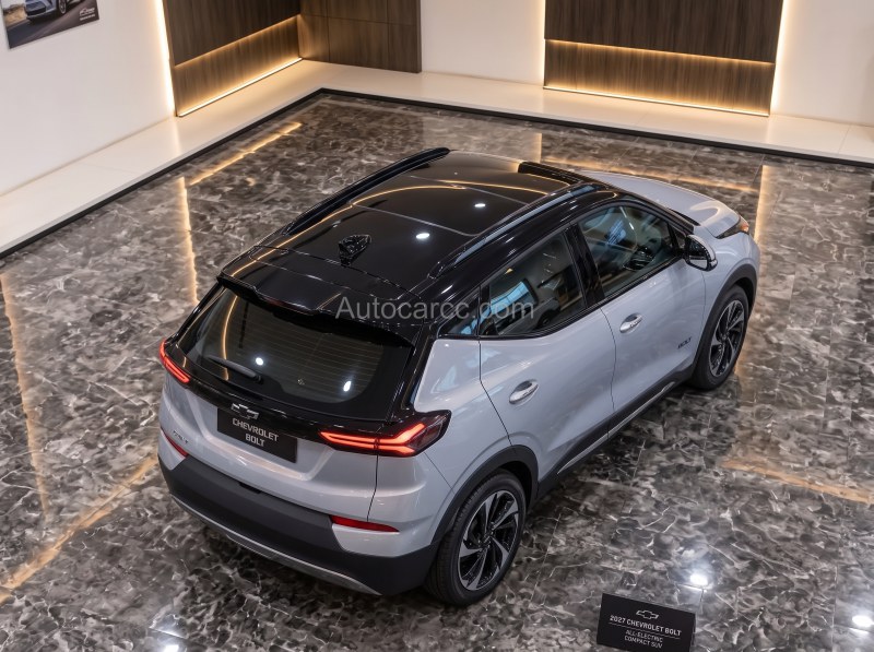2027 Chevrolet Bolt EV new all-electric compact SUV concept rear three-quarter view with Chevrolet Bolt tailgate