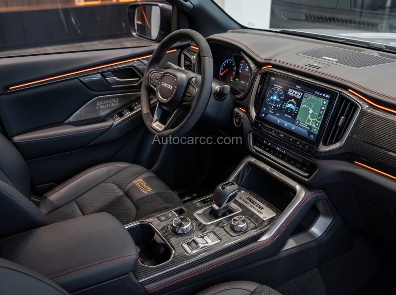 2027 Mazda Bongo Fighter Pickup Offroad interior cabin with Mazda steering wheel and touchscreen