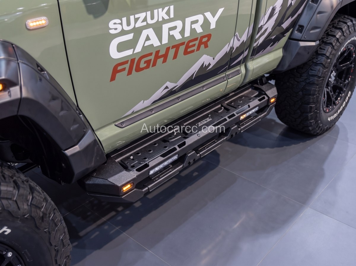 2027 Suzuki Carry Fighter Concept side view showing SUZUKI CARRY FIGHTER decal, mountain graphics and LED side steps
