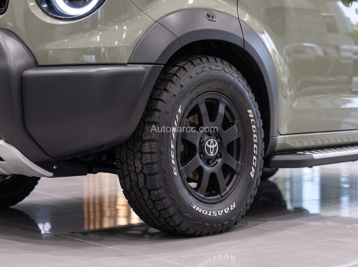 2027 Toyota Mini Camper Concept front wheel close-up with Roadstone all-terrain tire